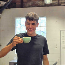 Load image into Gallery viewer, enjoying a cup of coffee after learning how to pour a flat white