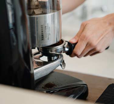 Learn how to correctly grind coffee beans on a commercial grinder ready for extraction